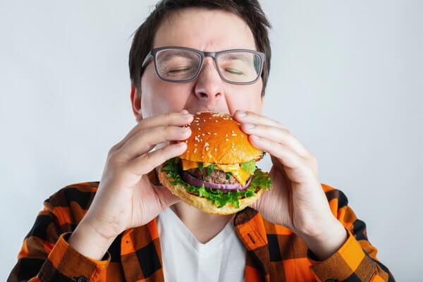 A man eating a burger